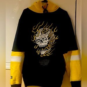 A black and yellow hoodie a stylish and eye-catching piece of clothing
